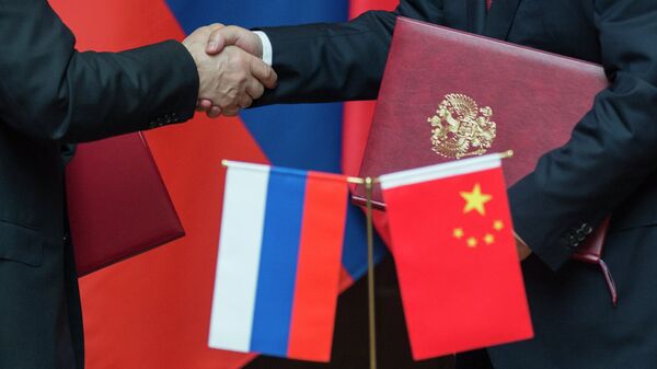 Zastave Rusije i Kine - Sputnik Srbija