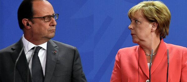 Fransoa Oland  i Angela Merkel - Sputnik Srbija