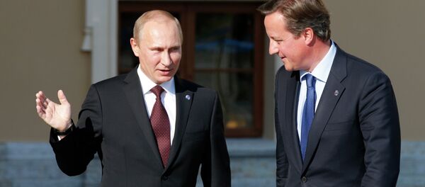 Владимир Путин и Дејвид Камерон Владимир Путин и Дејвид Камерон - Sputnik Србија