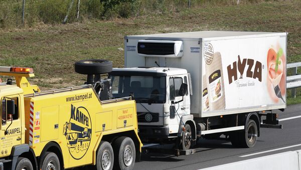 Kamion u kome su se ugušili migranti u Austriji - Sputnik Srbija