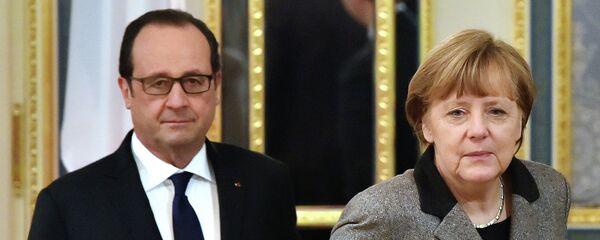 Франсоа Оланд и Ангела Меркел - Sputnik Србија
