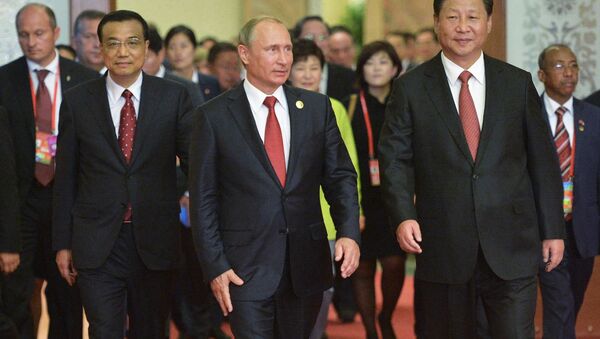 Predsednik RF Vladimir Putin u poseti Kini. - Sputnik Srbija