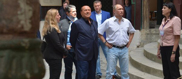 Vladimir Putin i Silvio Berluskoni na Krimu. - Sputnik Srbija