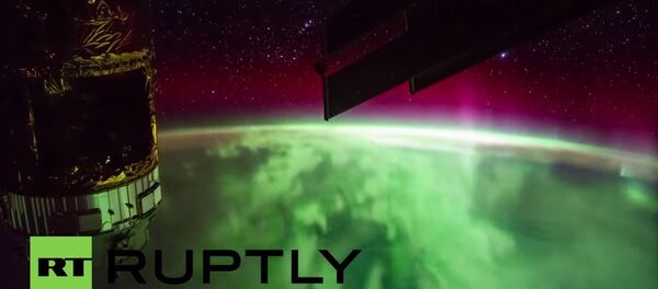 Северна светлост снимљена из свемира - Sputnik Србија