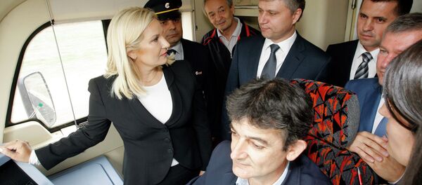 Зорана Михајловић и председник Руских железница Олег Белозјоров - Sputnik Србија