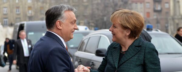 Viktor Orban i Angela Merkel Viktor Orban i Angela Merkel - Sputnik Srbija