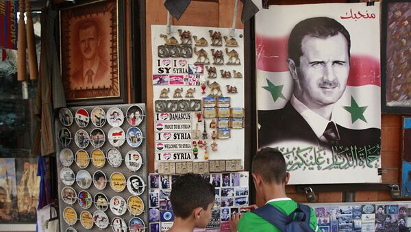 Портрет сиријског председника Башара Асада у продавници са сувенирима - Sputnik Србија