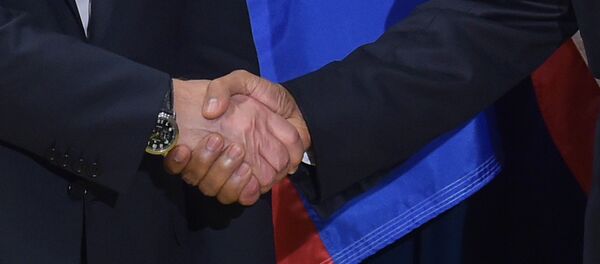 Vladimir Putin i Barak Obama Vladimir Putin i Barak Obama - Sputnik Srbija