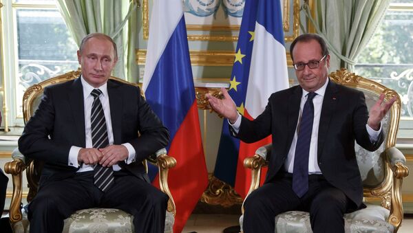 Predsednik Rusije Vladimir Putin i predsednik Francuske Fransoa Oland na sastanku u Parizu, 02.10.2015. - Sputnik Srbija