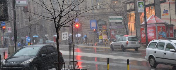 Kiša i sneg padaju u mnogim mestima u Srbiji - Sputnik Srbija