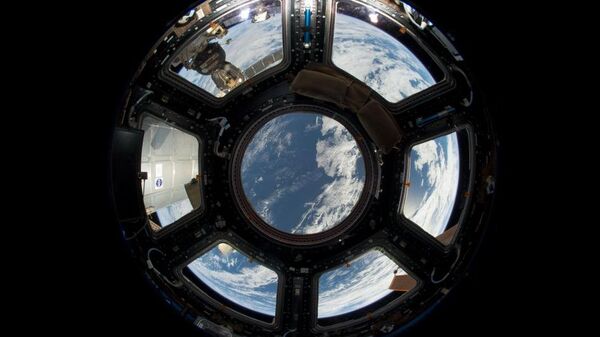 Поглед на Земљу са Међународне свемирске станице - Sputnik Србија