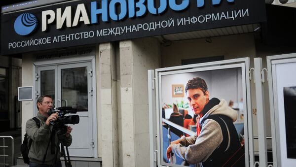 Андреј Стењин ,фотограф Риа Новости који је убијен просле године у Украјини - Sputnik Србија