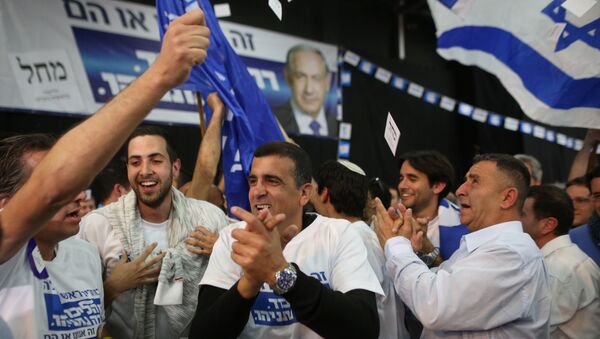 Pristalice izraelske partije Likud slave posle proglašenja pobede njihovog lidera Benjamina Netanijahua na parlamentarnim izborima 17. marta 2015. - Sputnik Srbija