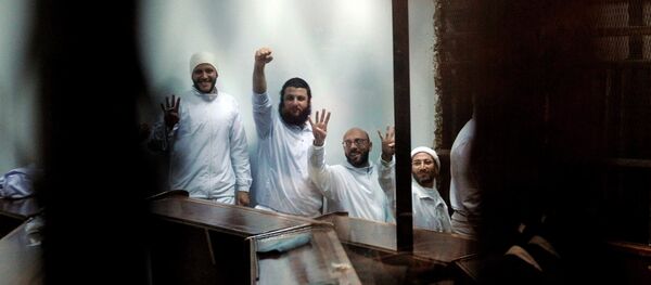 На смрт осуђене 22 Морсијеве присталице - Sputnik Србија