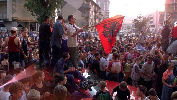 About 1,000 young Kosovar Albanians celebrate the UCK [Kosovo Liberation Army] victory over the Serbs with NATO's help in the centre of Pristina 02 July 1999 - Sputnik Srbija